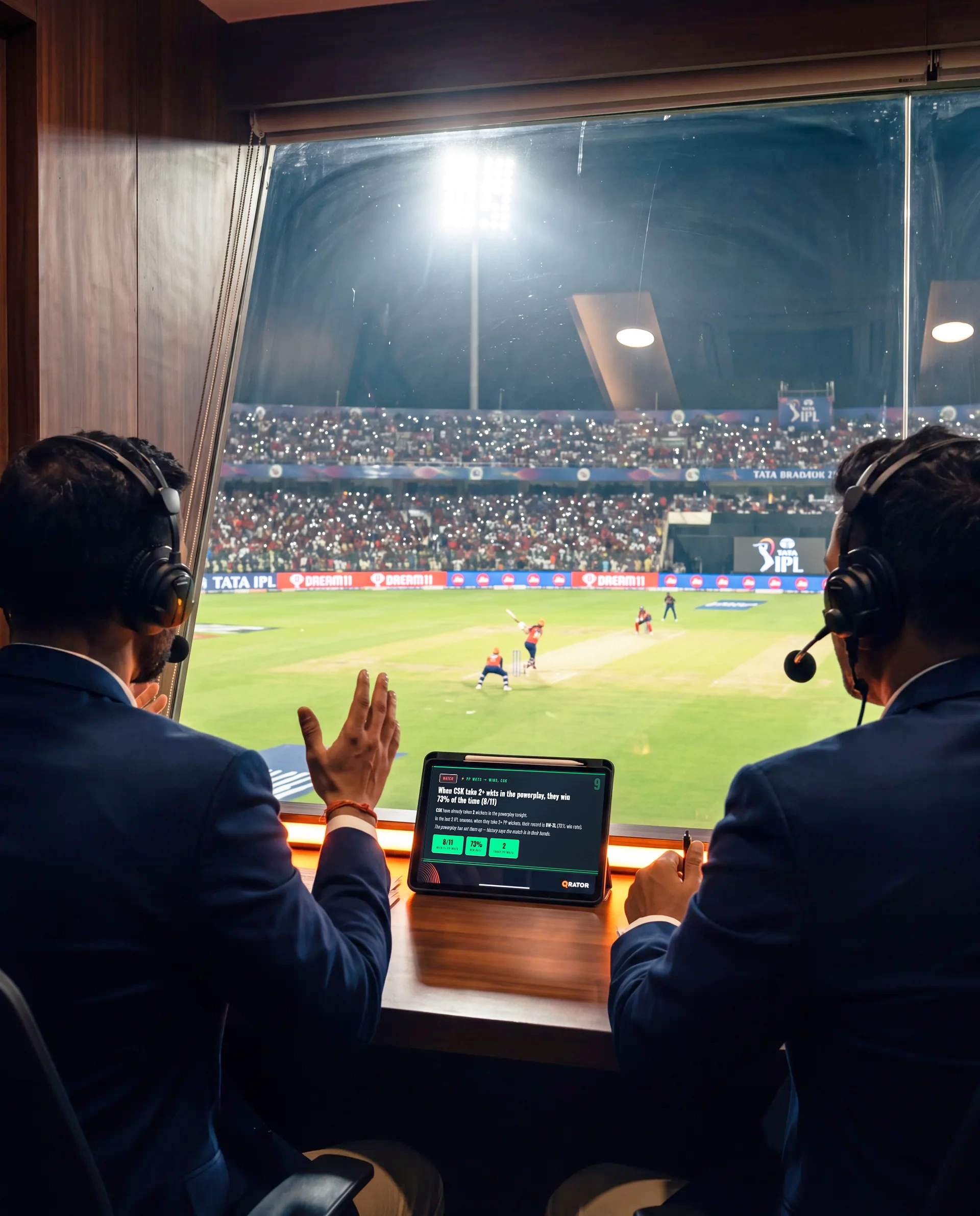 Commentators at IPL 2026 with QRATOR on tablet